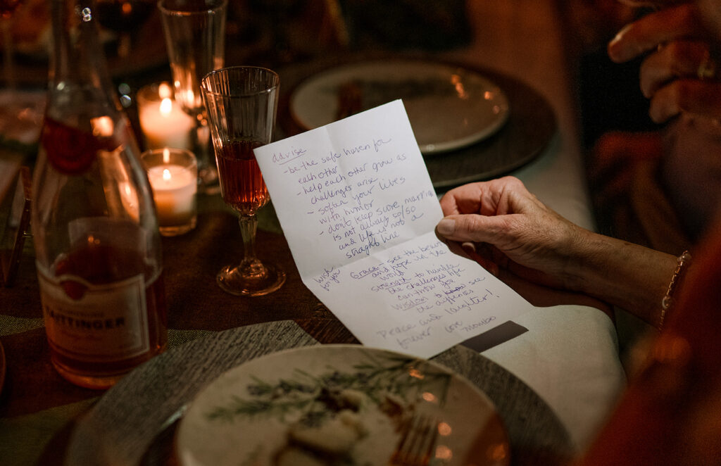 Documentary wedding details of the mother holding her notes for her wedding toast