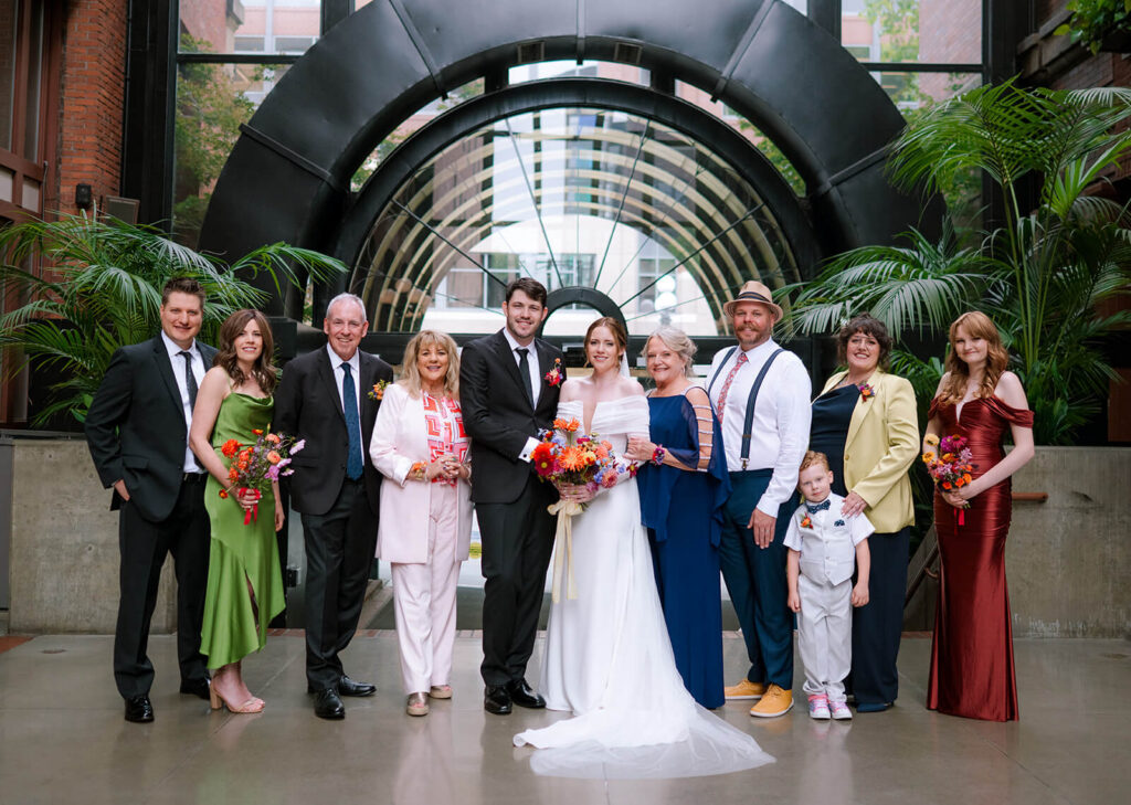 Family portrait in the atrium at europa wedding venue